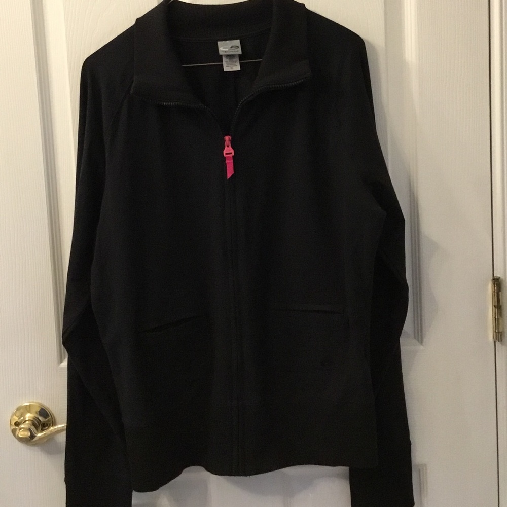 Champion athletic jacket in black size XL.   Zipper front.  2 pockets.